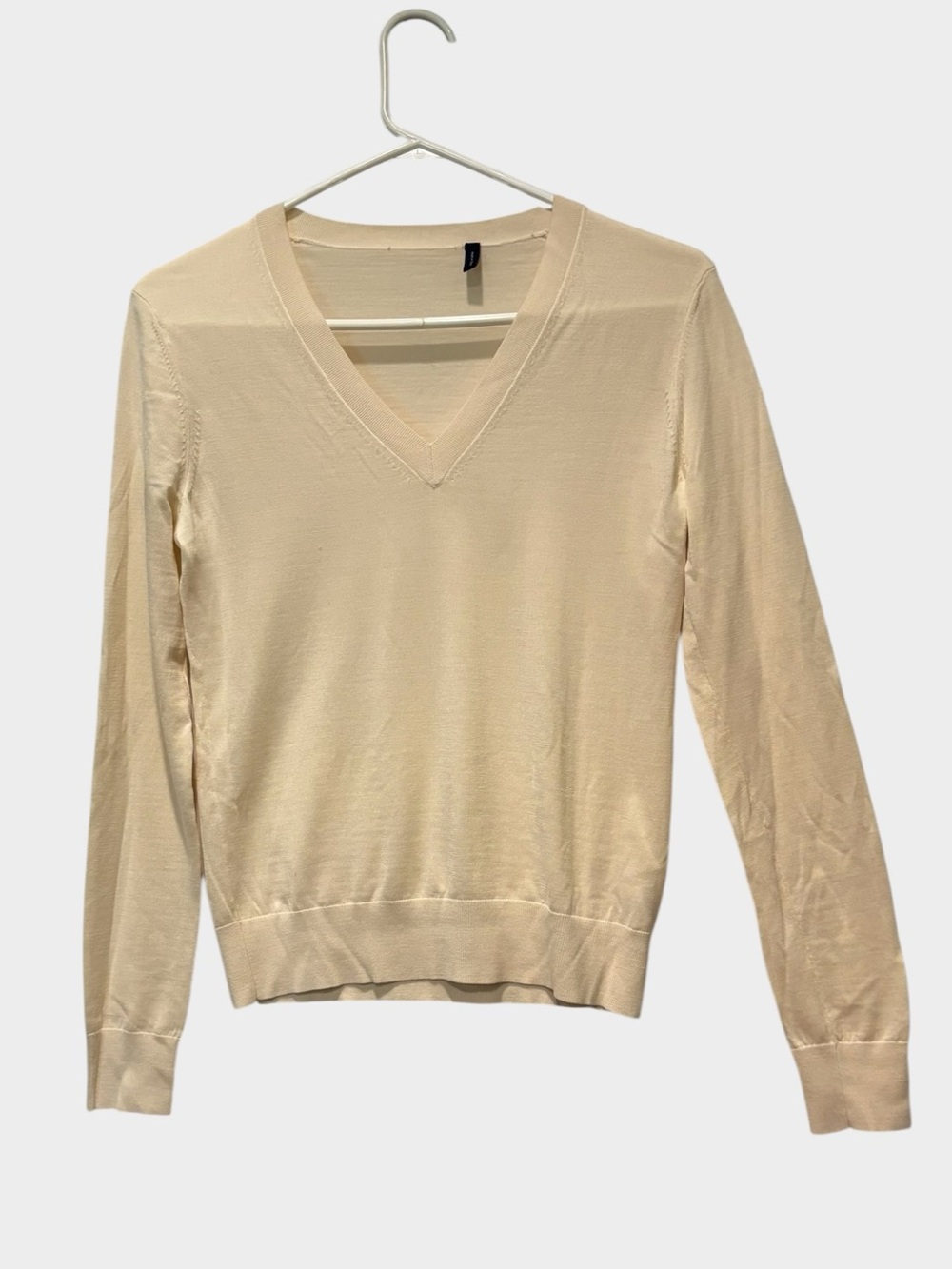 Theory - Women's V-neck long sleeve sweater. Size Small. Cream. Wool